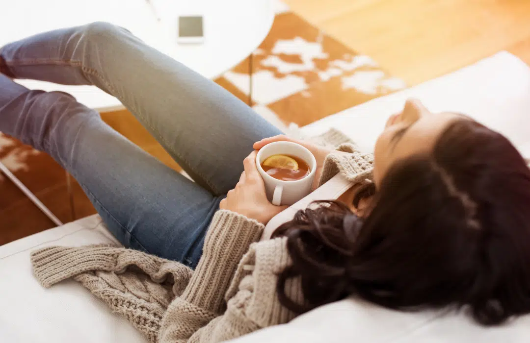 Woman relaxing with a cup of coffee